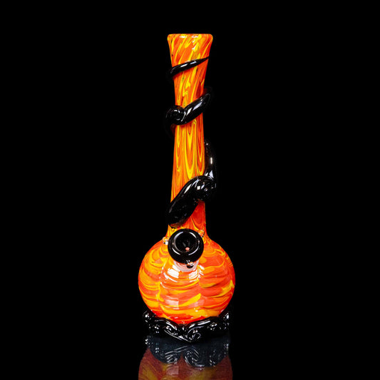 Glass bong with orange and black design